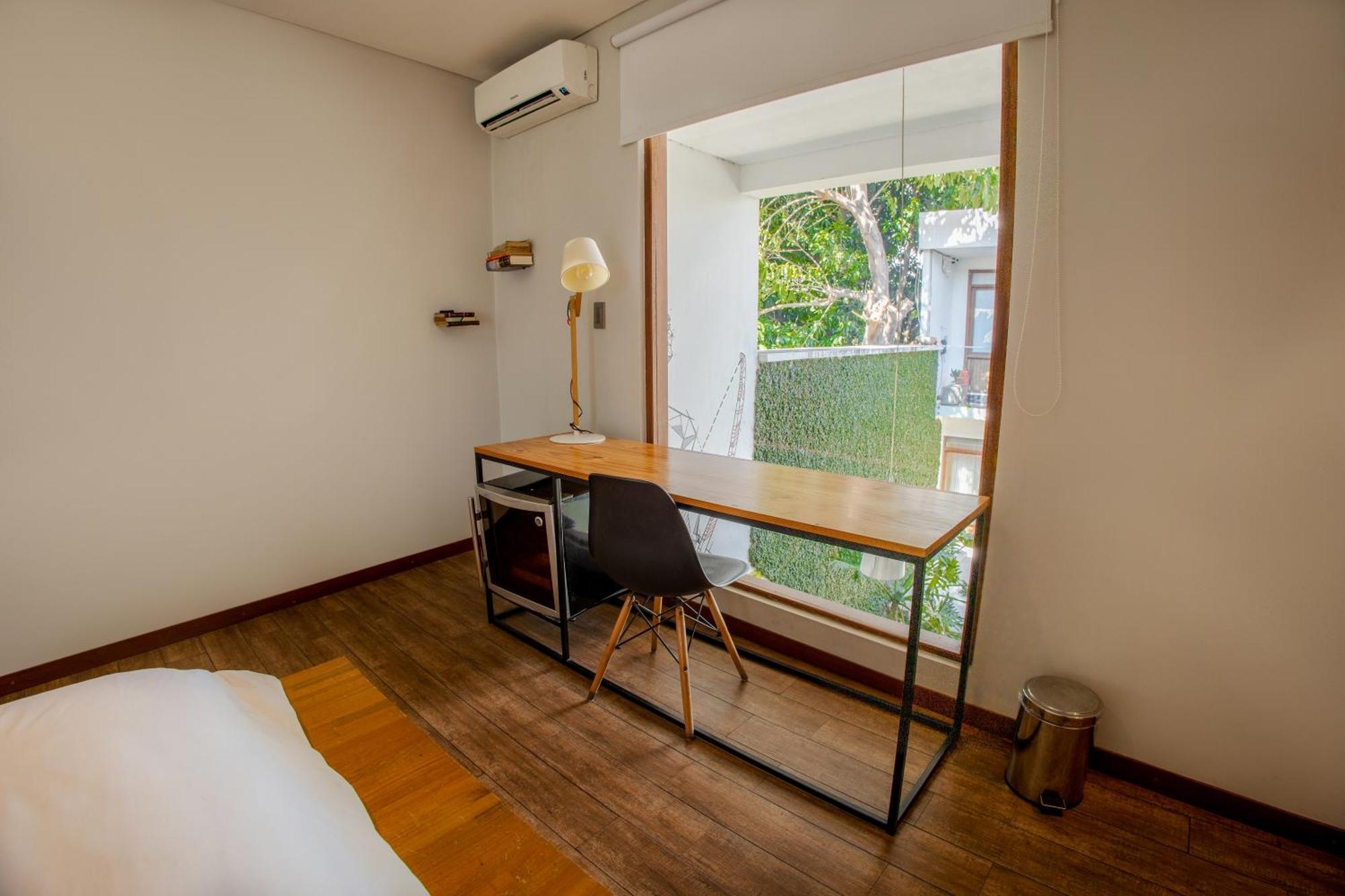 Cosmopolitano Hotel Boutique Santa Cruz de La Sierra Exterior foto A room at the hotel